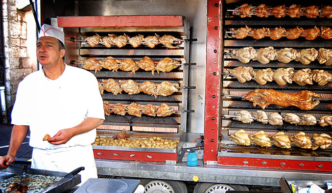 Beaune market day - rotisserie porc, poulet and other fowl