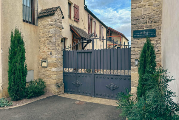 Domaine Amiot et Fils — entrance gate with the three roses insignia, Morey-Saint-Denis, Burgundy