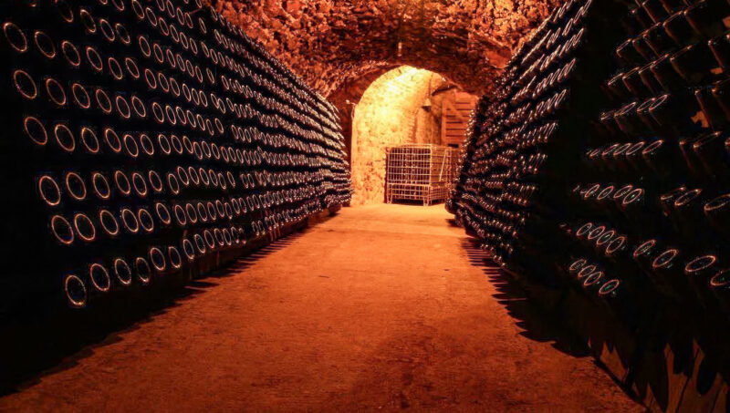 Bottles aging on lees in the Pierre Deville cellar — Grand Cru Verzy, Champagne